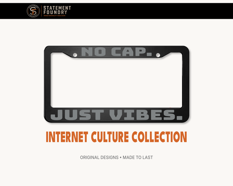 No Cap Just Vibes license plate frame with bold modern typography